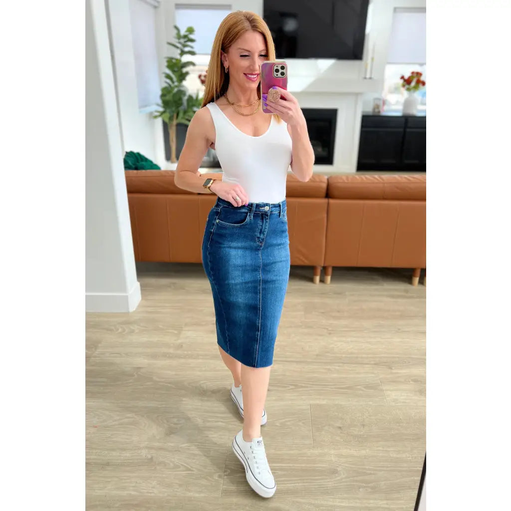 Get ready to rock your denim look with our Marcy High Rise Denim Midi Skirt from Judy Blue! With a flattering high rise