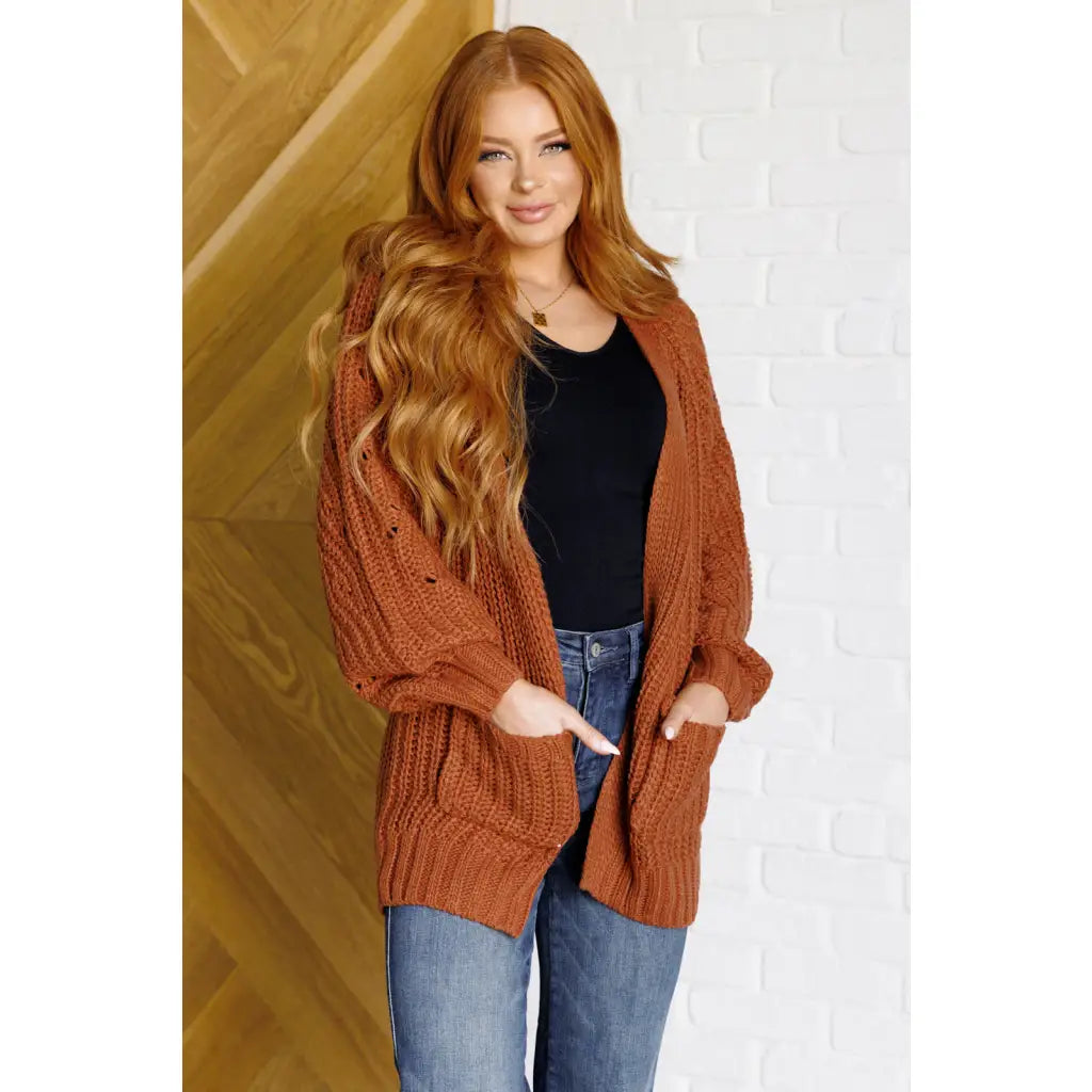 Stay cozy in our Maybe Monday Cardigan! This super soft sweater knit cardigan features an open front pockets a slouchy