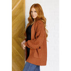 Stay cozy in our Maybe Monday Cardigan! This super soft sweater knit cardigan features an open front pockets a slouchy