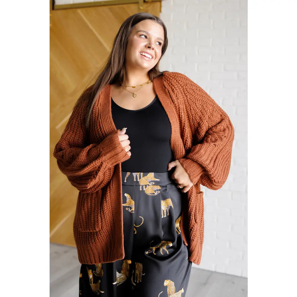 Stay cozy in our Maybe Monday Cardigan! This super soft sweater knit cardigan features an open front pockets a slouchy