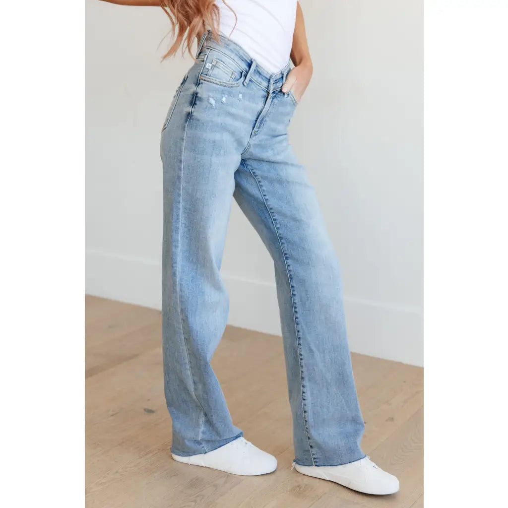 Get ready to redefine your denim game with our Mildred High Rise V Front Waistband Straight Jeans from Judy Blue!