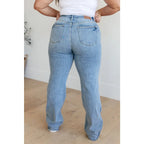 Get ready to redefine your denim game with our Mildred High Rise V Front Waistband Straight Jeans from Judy Blue!