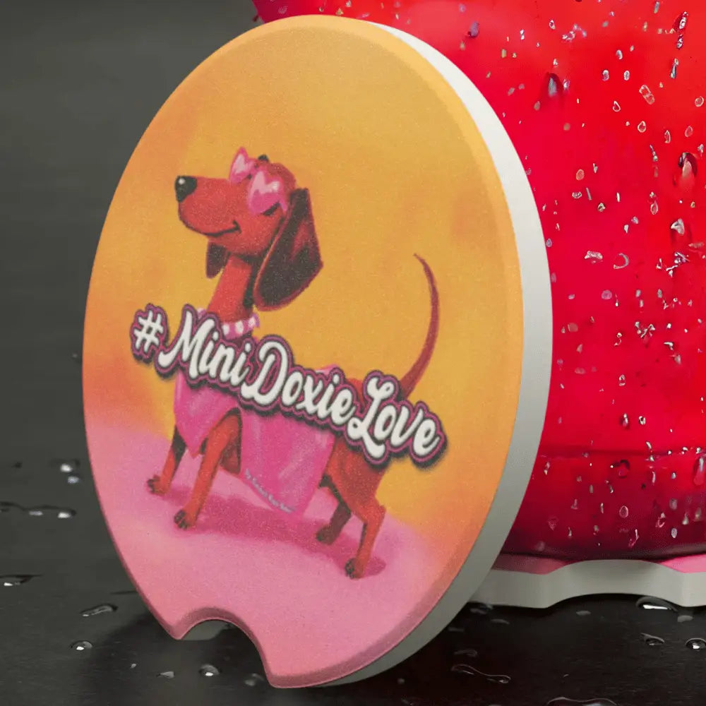 Soapstone car coaster in a bright pink dachshund design. Absorbs moisture fits most cup holders. Choose single or set.