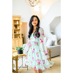 Floral chiffon mini dress in mint with pink blooms. Includes pockets! Now plus sizes. Perfect for spring styling