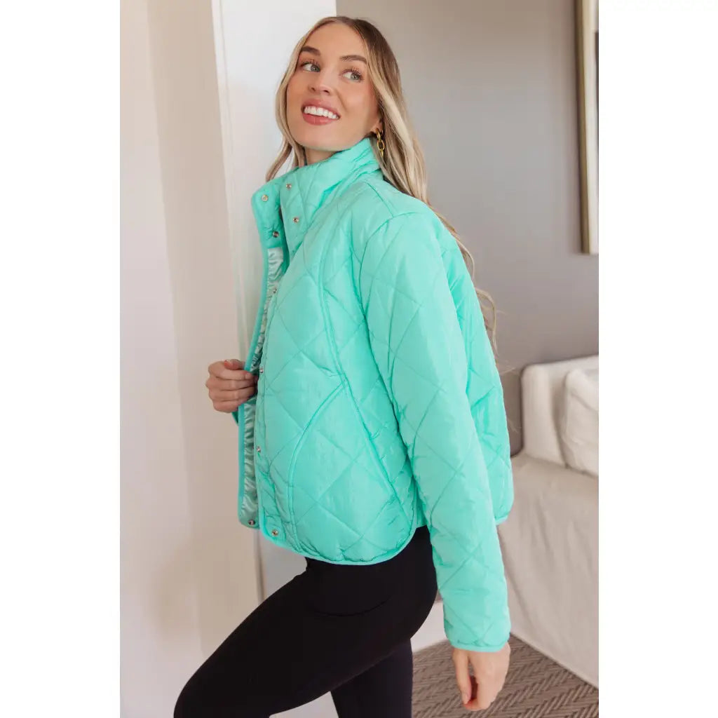 Mint quilted puffer jacket with mock neck and snap front. Plus sizes available. Slightly oversized fit cozy boutique