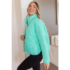 Mint quilted puffer jacket with mock neck and snap front. Plus sizes available. Slightly oversized fit cozy boutique