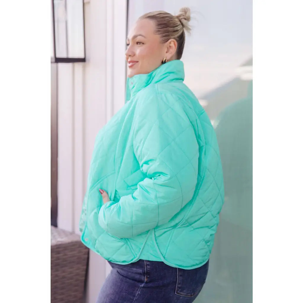 Mint quilted puffer jacket with mock neck and snap front. Plus sizes available. Slightly oversized fit cozy boutique