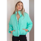 Mint quilted puffer jacket with mock neck and snap front. Plus sizes available. Slightly oversized fit cozy boutique