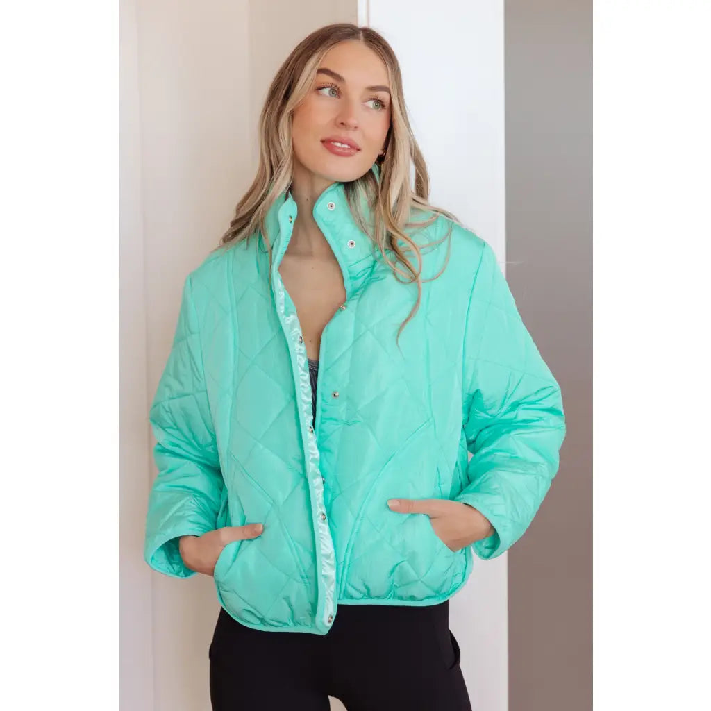 Mint quilted puffer jacket with mock neck and snap front. Plus sizes available. Slightly oversized fit cozy boutique