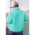 Mint quilted puffer jacket with mock neck and snap front. Plus sizes available. Slightly oversized fit cozy boutique
