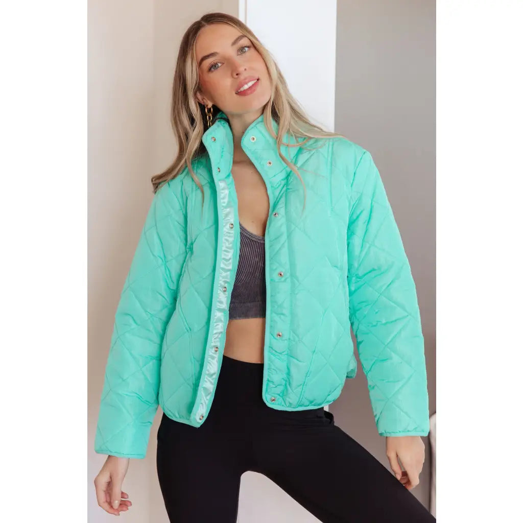 Mint quilted puffer jacket with mock neck and snap front. Plus sizes available. Slightly oversized fit cozy boutique