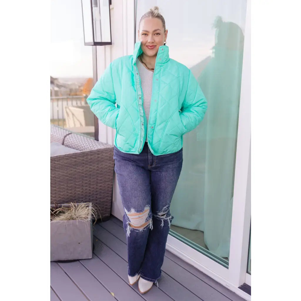 Mint quilted puffer jacket with mock neck and snap front. Plus sizes available. Slightly oversized fit cozy boutique