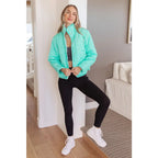 Mint quilted puffer jacket with mock neck and snap front. Plus sizes available. Slightly oversized fit cozy boutique