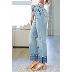 Make a statement in our Miranda Plaid Cuff Judy Blue Jeans. Featuring high rise medium vintage wash 4-way stretch