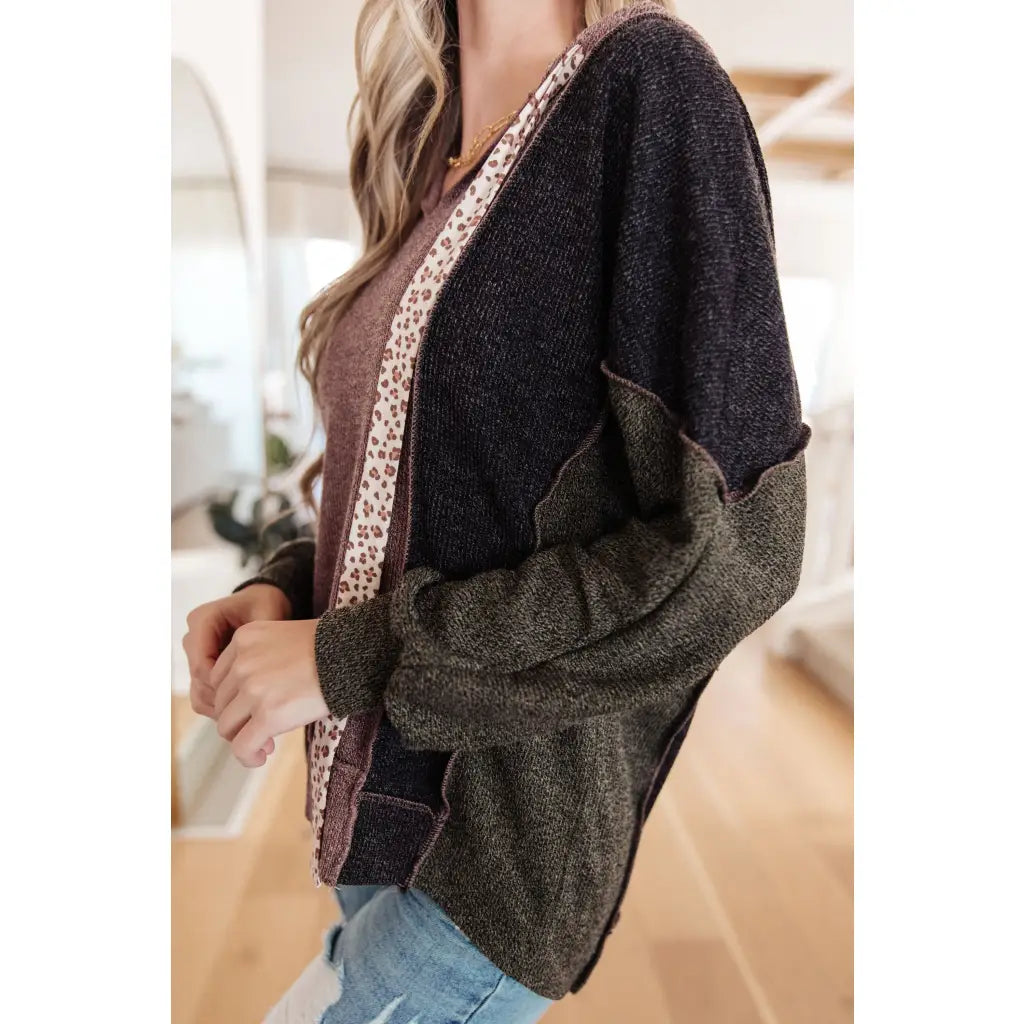 Look cozy and stylish in our Mixed Emotions Leopard Lined Hoodie. Enjoy the comfort of soft knit fabric dolman sleeves