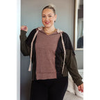 Look cozy and stylish in our Mixed Emotions Leopard Lined Hoodie. Enjoy the comfort of soft knit fabric dolman sleeves