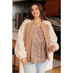 Stay warm and stylish in our Mocha Latte Bomber Jacket. Soft Sherpa fleece with plus size fit for the perfect cozy