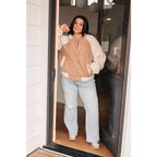 Stay warm and stylish in our Mocha Latte Bomber Jacket. Soft Sherpa fleece with plus size fit for the perfect cozy