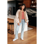 Stay warm and stylish in our Mocha Latte Bomber Jacket. Soft Sherpa fleece with plus size fit for the perfect cozy