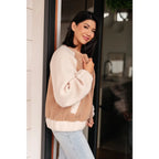 Stay warm and stylish in our Mocha Latte Bomber Jacket. Soft Sherpa fleece with plus size fit for the perfect cozy