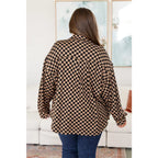 Stay cozy in the mocha latte and black checkered shacket with brushed woven fabric exposed seams a relaxed fit. Plus