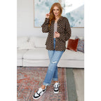 Stay cozy in the mocha latte and black checkered shacket with brushed woven fabric exposed seams a relaxed fit. Plus