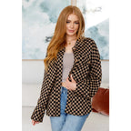 Stay cozy in the mocha latte and black checkered shacket with brushed woven fabric exposed seams a relaxed fit. Plus