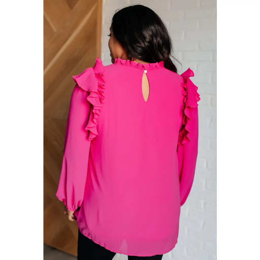 Discover the My Good Graces Ruffled Blouse a romantic pink mock neck top with balloon sleeves. Plus it’s available