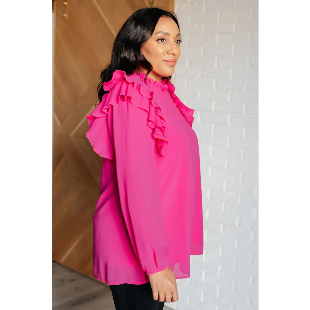 Discover the My Good Graces Ruffled Blouse a romantic pink mock neck top with balloon sleeves. Plus it’s available