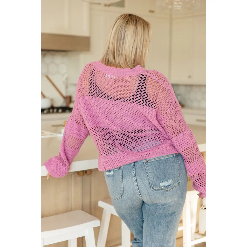 Our Latest Love sweater combines a cozy loose pink knit with block stripes for chic look. The ribbed crewe round
