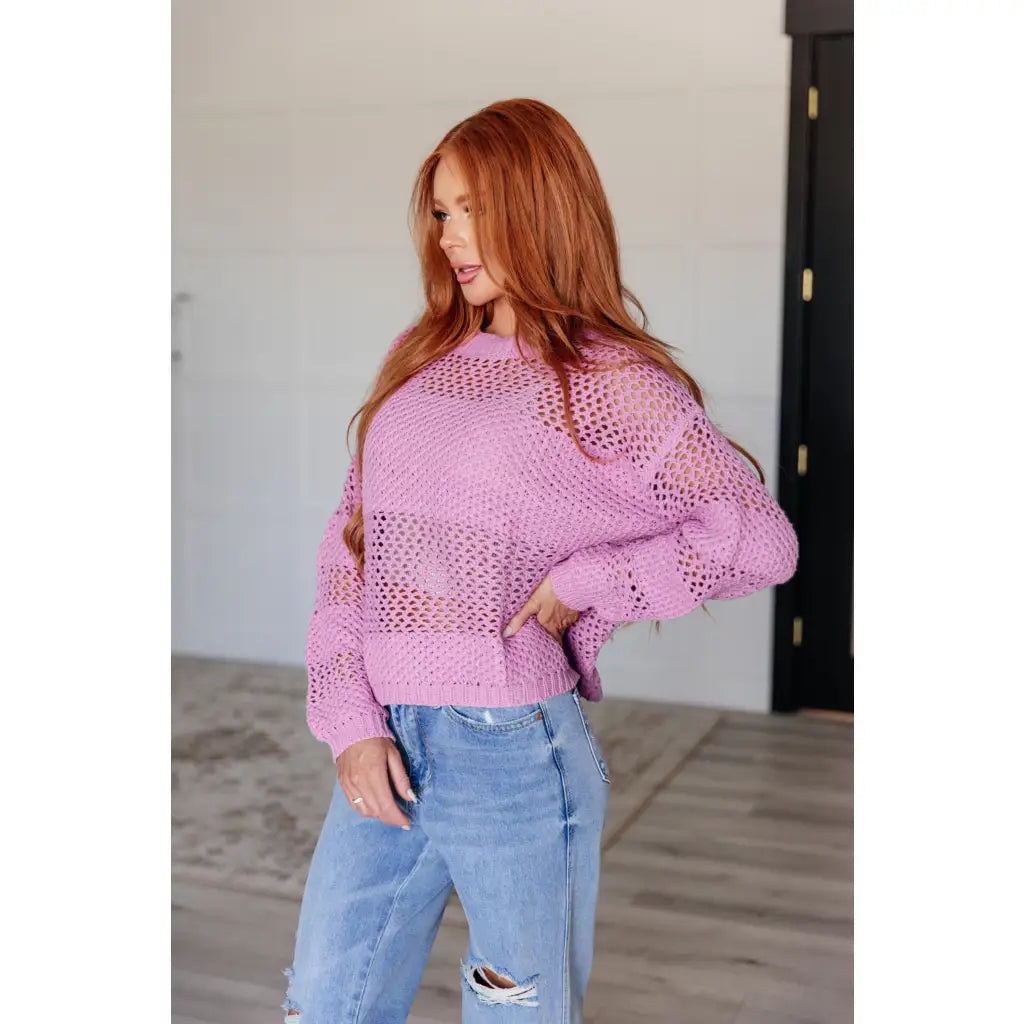 Our Latest Love sweater combines a cozy loose pink knit with block stripes for chic look. The ribbed crewe round