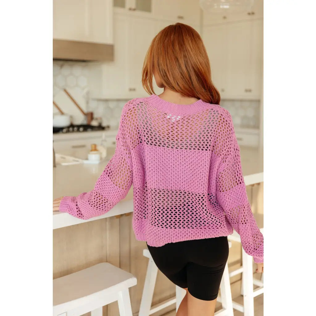 Our Latest Love sweater combines a cozy loose pink knit with block stripes for chic look. The ribbed crewe round