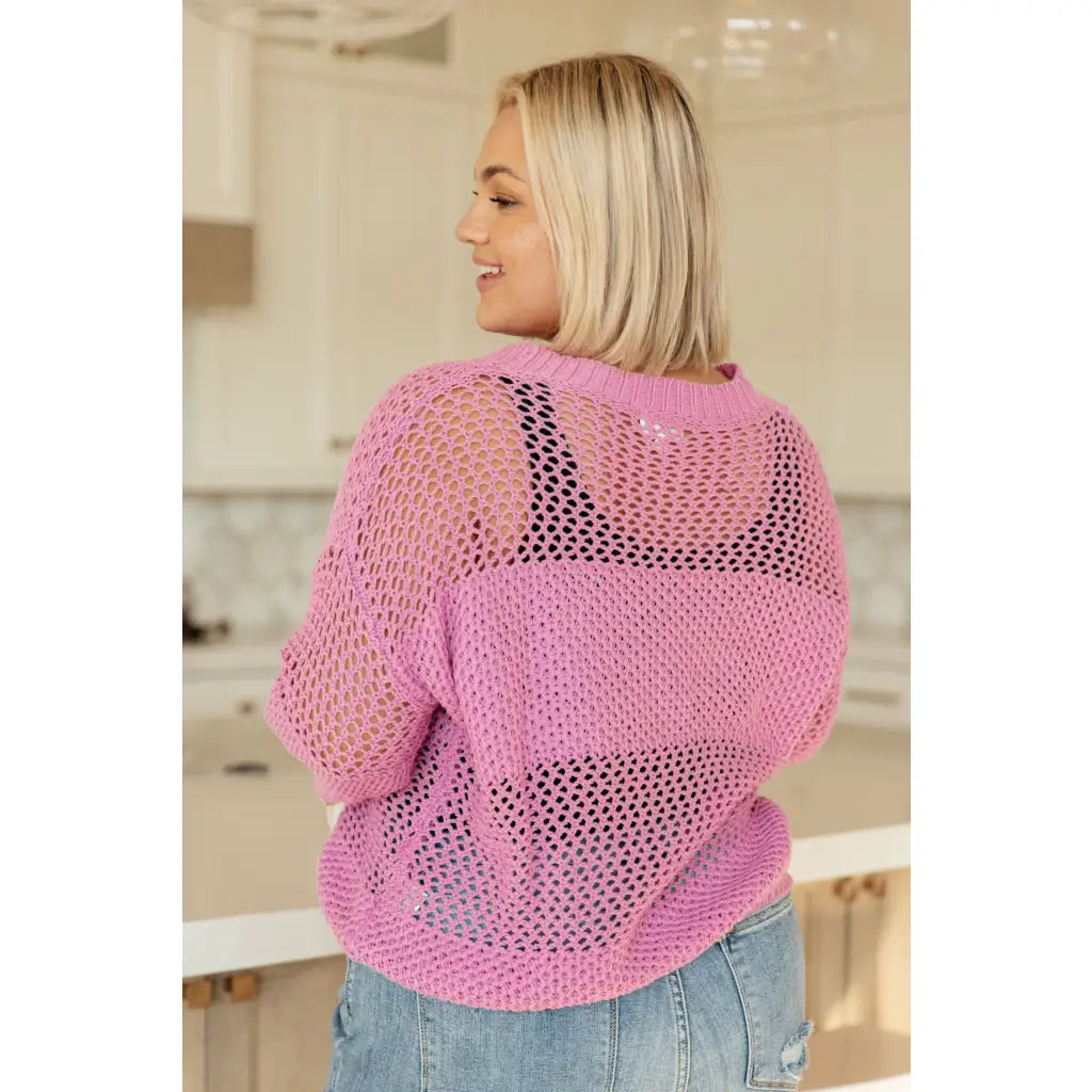 Our Latest Love sweater combines a cozy loose pink knit with block stripes for chic look. The ribbed crewe round