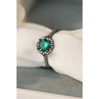 Our stunning Natural Paraiba Blue Zircon Flower Shape Ring features 925 sterling sliver that is black gold-plated