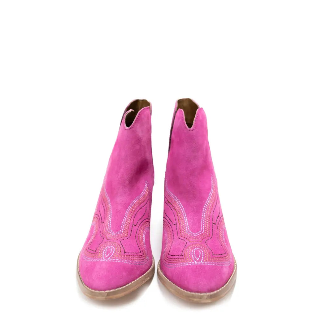 Our Next Journey Ankle Booties in Magenta are sure to take you anywhere life hence the name! They showcase a beautiful