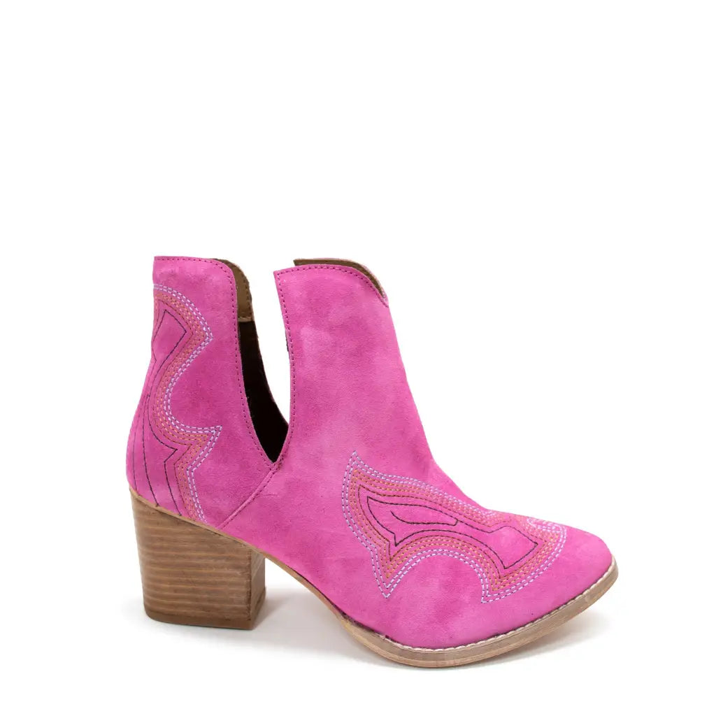 Our Next Journey Ankle Booties in Magenta are sure to take you anywhere life hence the name! They showcase a beautiful
