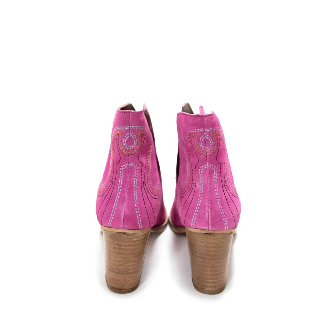Our Next Journey Ankle Booties in Magenta are sure to take you anywhere life hence the name! They showcase a beautiful