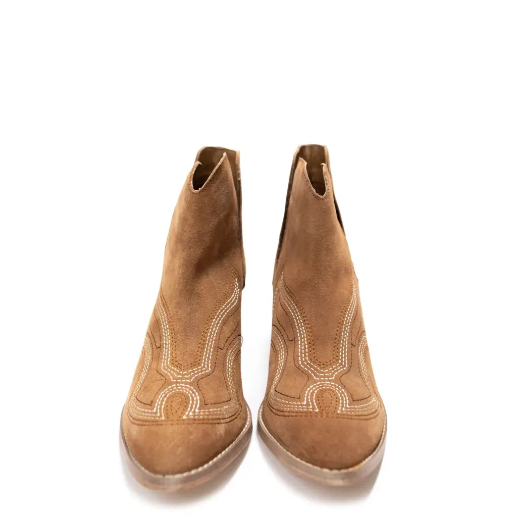 Our Next Journey Ankle Booties in Tan are sure to take you anywhere life hence the name! They showcase a beautiful