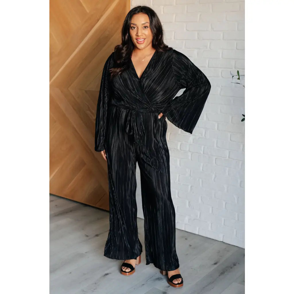 Look stylish this party season with our Night Out Black Plisse Jumpsuit. Crafted from silky accordion plisse