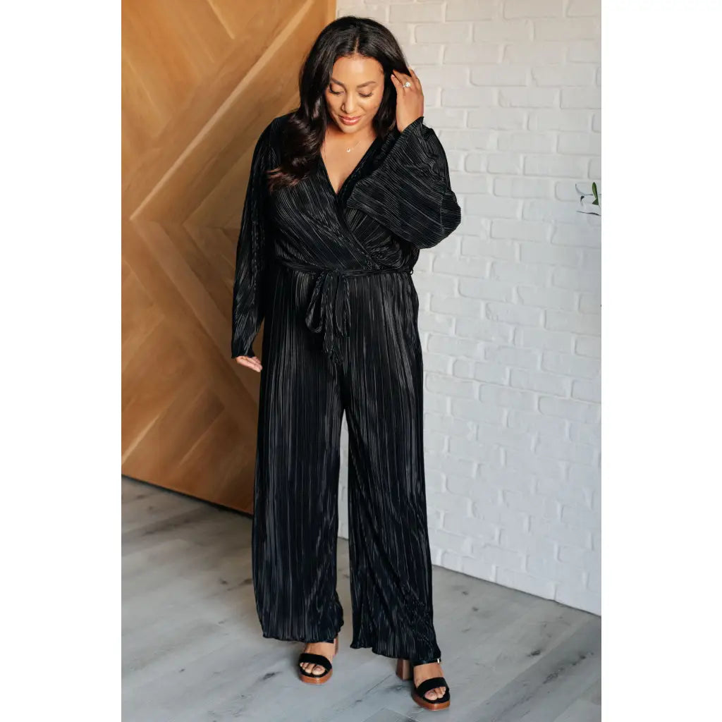Look stylish this party season with our Night Out Black Plisse Jumpsuit. Crafted from silky accordion plisse