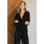 Look stylish this party season with our Night Out Black Plisse Jumpsuit. Crafted from silky accordion plisse