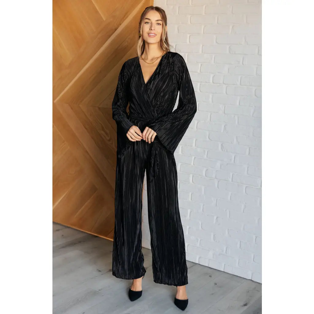 Look stylish this party season with our Night Out Black Plisse Jumpsuit. Crafted from silky accordion plisse