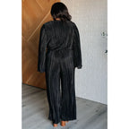 Look stylish this party season with our Night Out Black Plisse Jumpsuit. Crafted from silky accordion plisse