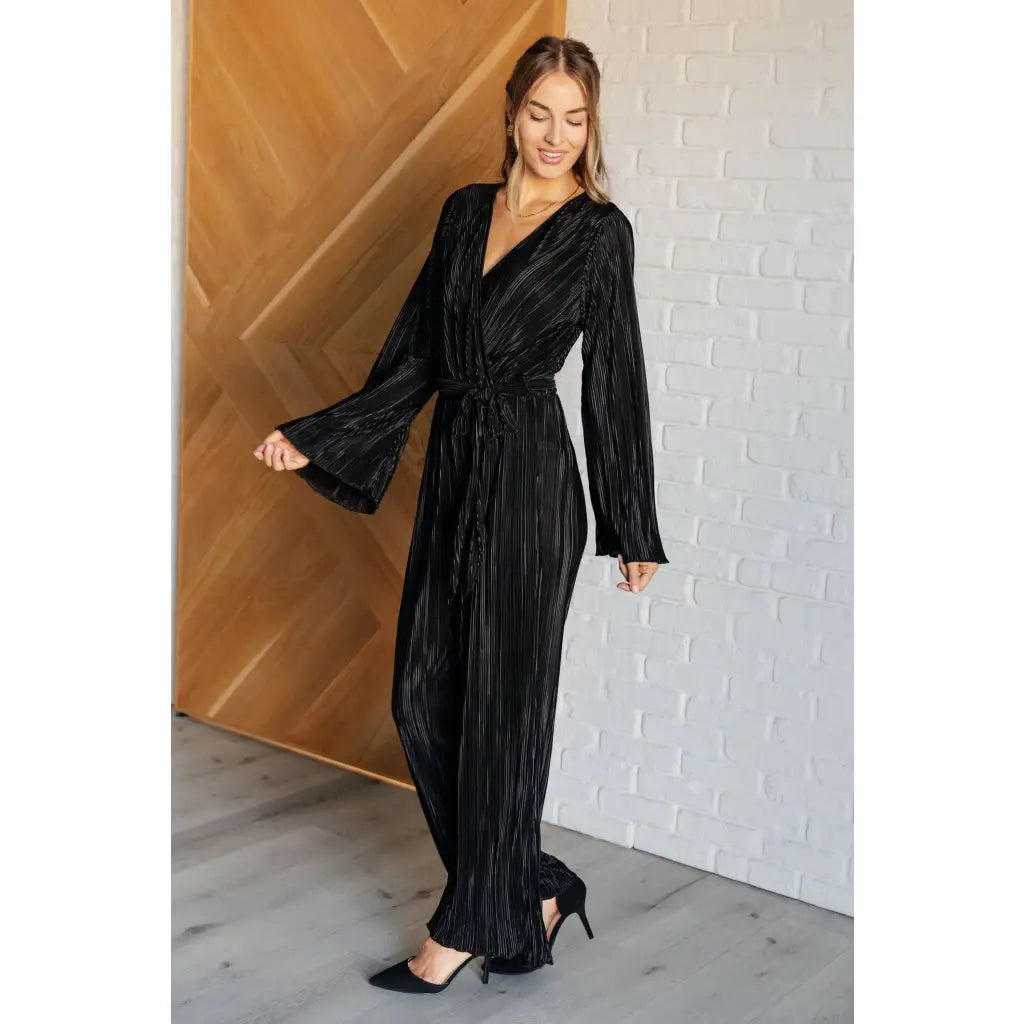 Look stylish this party season with our Night Out Black Plisse Jumpsuit. Crafted from silky accordion plisse