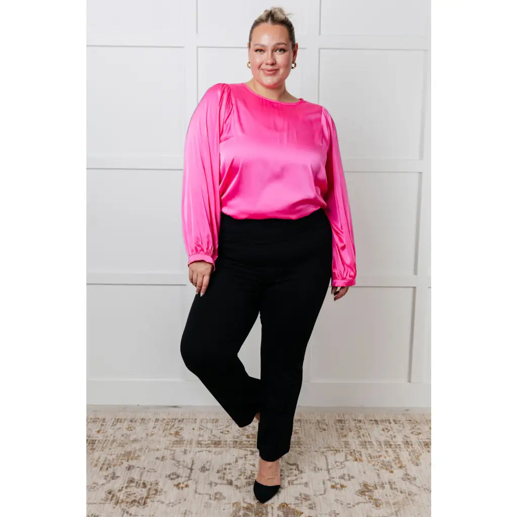 Add a touch of playful elegance to your wardrobe with our Not Exaggerating Satin Puff Sleeve Blouse. Plus it’s
