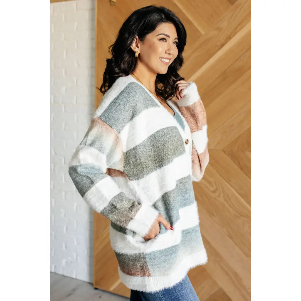 Fall in love with our Ombre Feelings Striped Cardigan! Made from a soft and cozy brushed sweater knit it features deep
