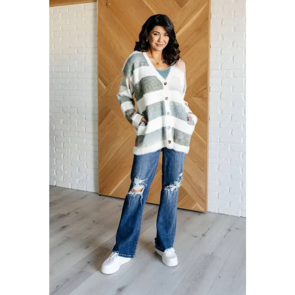 Fall in love with our Ombre Feelings Striped Cardigan! Made from a soft and cozy brushed sweater knit it features deep