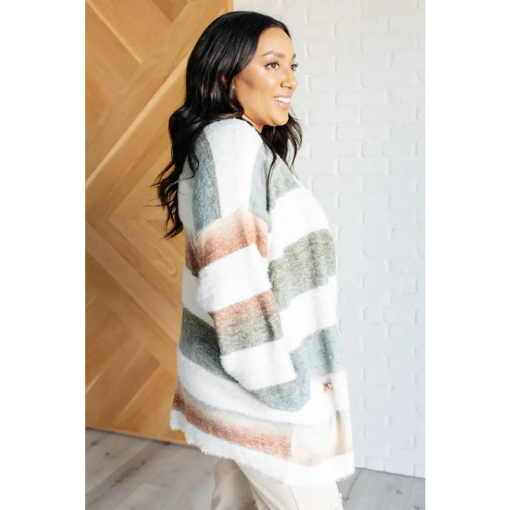 Fall in love with our Ombre Feelings Striped Cardigan! Made from a soft and cozy brushed sweater knit it features deep