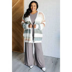 Fall in love with our Ombre Feelings Striped Cardigan! Made from a soft and cozy brushed sweater knit it features deep