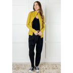 Our Pear-fectly Yellow Activewear Jacket is form-fitting and features a brushed microfiber material with mock neckline